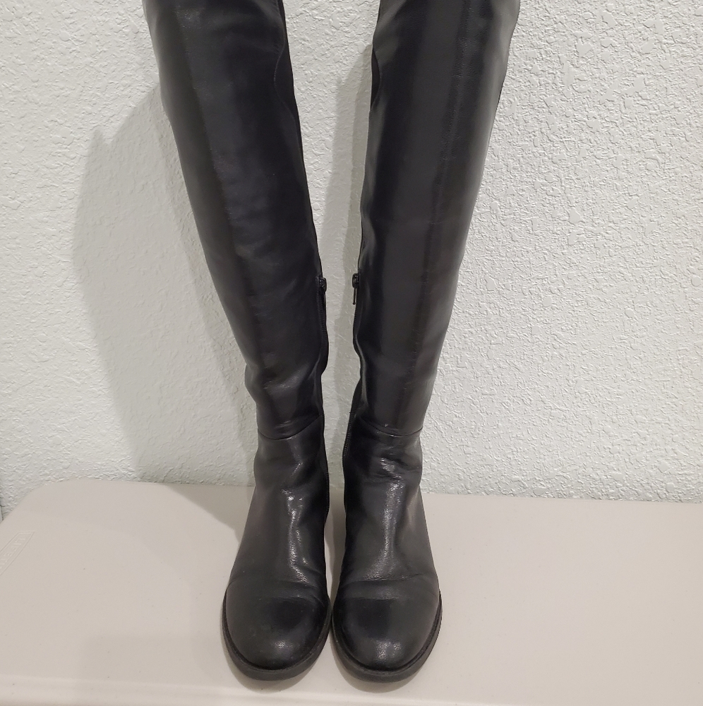 Above the knee black boots